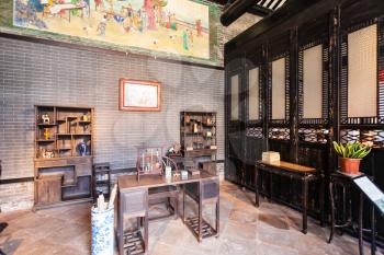 GUANGZHOU, CHINA - MARCH 31, 2017: working room in interior of Chen Clan Ancestral Hall (Guangdong Folk Art Museum) in Guangzhou city. The house was prepared for imperial examinations in 1894