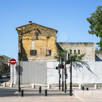 Travel to Provence, France - road to square Place des Arenes in Nimes city