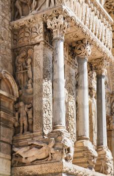 Travel to Provence, France - outdoor columns of ancient Church of St. Trophime in Arles city