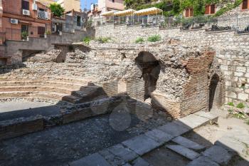 travel to Sicily, Italy - ruins of ancient roman theater Odeon in Taormina city.