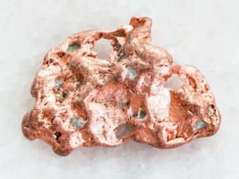 macro shooting of natural mineral rock specimen - Native copper stone on white marble background