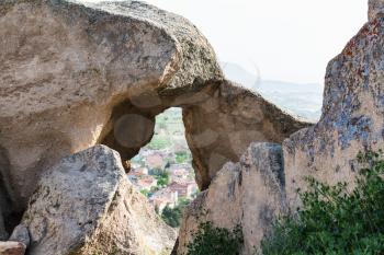 Travel to Turkey - old boulders over Uchisat village in Cappadocia in spring