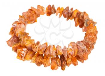 bracelet from two strings of rough amber stones isolated on white background