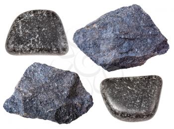 collection of natural mineral specimens - various Chromite stones (chromium ore) isolated on white background