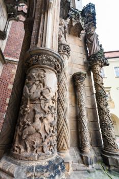 travel to Poland - decoration of gate of Breslauer Dom (Cathedral of St John the Baptist) in Ostrow Tumski district of Wroclaw city in autumn