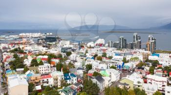 travel to Iceland - aerial view of Reykjavik city with harbor and Atlantic ocean coast from Hallgrimskirkja church in autumn