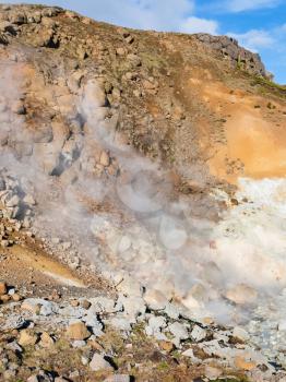 travel to Iceland - thermal spring at hill slope in geothermal Krysuvik area on Southern Peninsula (Reykjanesskagi, Reykjanes Peninsula) in september