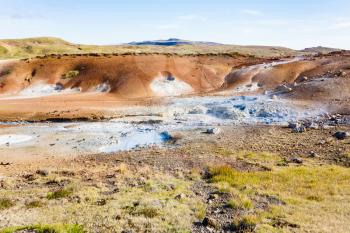 travel to Iceland - view of geothermal Krysuvik area with mudpots on Southern Peninsula (Reykjanesskagi, Reykjanes Peninsula) in september