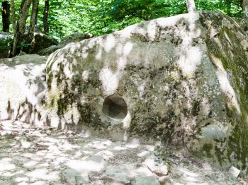 tour to Shapsugskaya anomalous zone - carved rock in prehistoric Shambala quarry in Abinsk Foothills of Caucasus Mountains in Kuban region of Russia