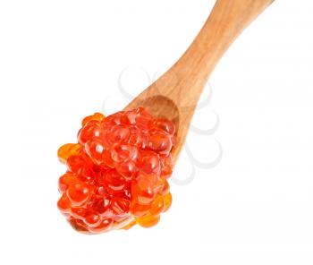 top view of little wooden spoon with russian red caviar of sockeye salmon fish isolated on white background