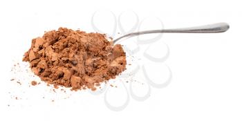 side view of pile of ground carob powder with steel spoon isolated on white background