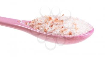 side view of ceramic spoon with pink Himalayan Salt close up isolated on white background