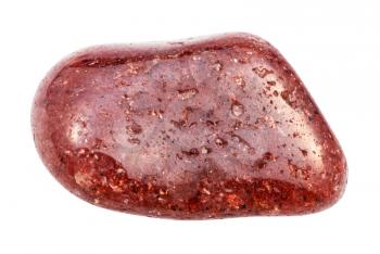 closeup of sample of natural mineral from geological collection - tumbled red Aventurine gem isolated on white background