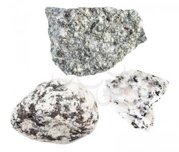 set of various diorite rocks isolated on white background