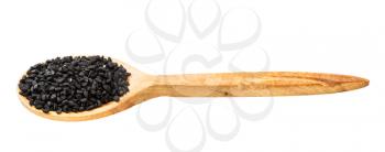 wooden spoon with nigella seeds isolated on white background