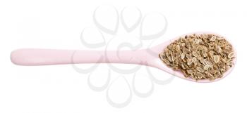 top view of ceramic spoon with dill seeds isolated on white background