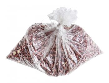 raw adzuki beans in knotted plastic bag isolated on white background