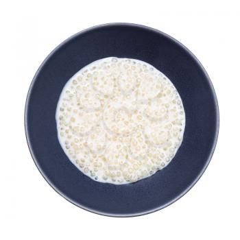 top view of boiled sabudana (tapioca sago) in gray bowl isolated on white background