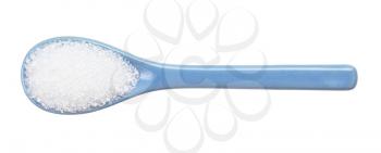 top view of crystalline citric acid in ceramic spoon isolated on white background