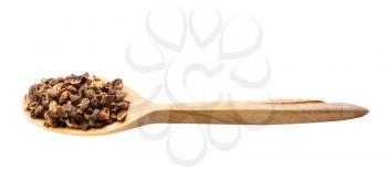 dried pink sichuan pepper in wooden spoon isolated on white backgrouns