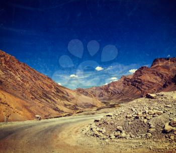 Vintage retro effect filtered hipster style travel image of Manali-Leh road to Ladakh in Indian Himalayas with grunge texture overlaid. Ladakh, India