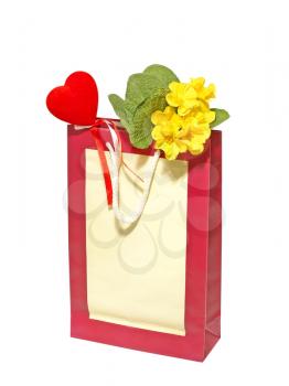 A Valentines Day holiday gift bag with red heart and flowers isolated on a white background.