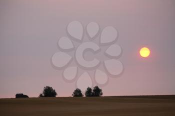 Morning sun seen through thin clouds in scenic Saskatchewan