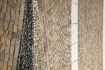 brick  the in mozzate  street lombardy italy  varese abstract   pavement of a curch and marble

