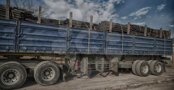 blur in south africa truck full of forest wood dirt and dust