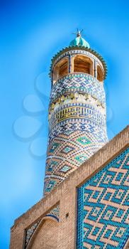 in iran the old      mosque and traditional wall tile incision near    minaret