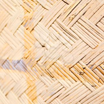 a wall build on wicker bamboo like abstract vintage surface