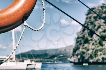 blur  in  philippines   a buoy in boat neat the pacific ocean bokeh and mountain background