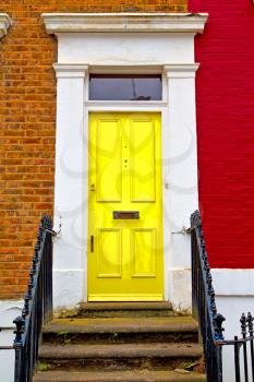notting hill in london england old suburban and antiqueyellow    wall door 