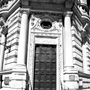 wooden parliament in london old   door and marble antique  wall