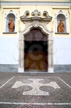  vanzaghello italy   church  varese  the old door entrance and mosaic sunny daY rose window