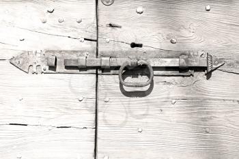 europe old in  italy  antique close brown door and rusty lock  closeup