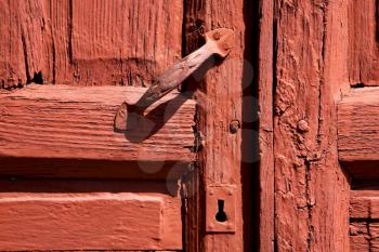 spain knocker lanzarote abstract door wood in the red brown 

