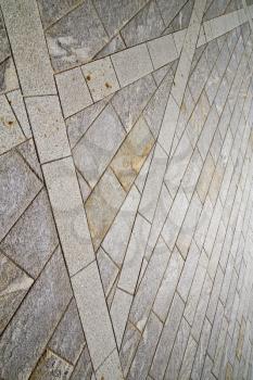  brick in the  casorate sempione street lombardy italy  varese abstract   pavement of a curch and marble
