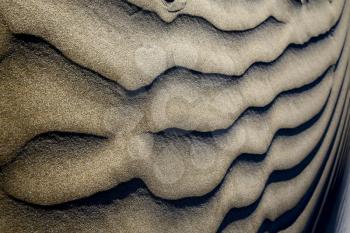 
 abstract texture of a  dry sand and the beach lanzarote spain