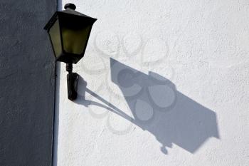 street lamp a bulb in the blue sky wall arrecife teguise lanzarote spain