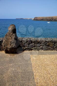 pavment lanzarote  in spain musk pond beach  water yacht boat  and summer 
