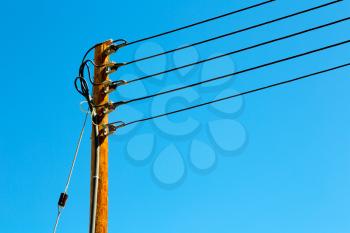  wood pylon energy and current line   in oman the electric cable