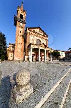 in  the parabiago old   church  closed brick tower sidewalk italy  lombardy   