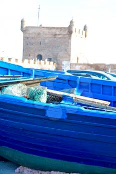   boat and sea      in africa morocco old castle brown brick  sky pier
