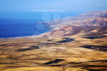 view from the top in lanzarote spain africa and house field coastline
