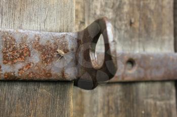 Old wooden door with bolt and nut 20555
