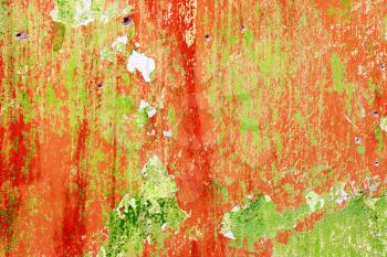 Red and green wall backdrop. Rough housework wallpaper design background. Color room interior decoration texture template
