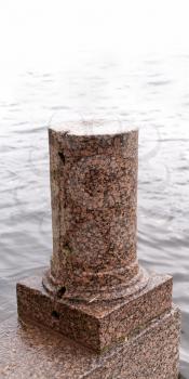 Granite column base as a pedestal for some thing