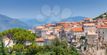Ancient town cityscape with stone houses and red tile roofs. Sartene, South Corsica, France