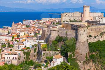 Landscape of old town Gaeta with ancient castle on hill, Italy
